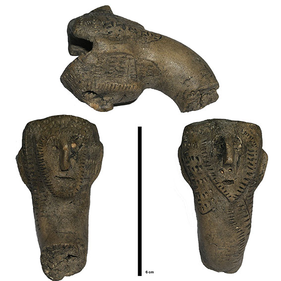 Bowl and fragment of a pipe shank with two human faces, one facing the smoker, the other in the opposite direction. The image shows the bowl viewed sideways as well as both faces viewed head-on. The pipe is decorated with little notches in the clay.